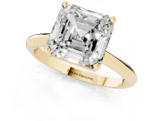 Asscher Cut Diamond Solitaire Ring Set in Yellow gold with Prong Setting on a Plain Round Band