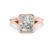 Bezel Set Radiant Cut Diamond Solitaire Ring Set in Rose gold with Tapered Band