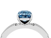 Fancy Blue Emerald Cut Diamond Solitaire Ring Set in Platinum with Slim Pavé Band and Prong Setting