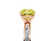 Fancy Yellow Cushion Cut Diamond Solitaire Ring Set in Rose gold with Channel-Set Baguette Band and Prong Setting