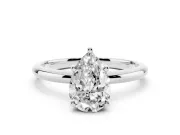 Pear Cut Diamond Solitaire Engagement Ring Set in Platinum with Prong Setting and Polished Band