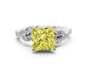 Fancy Yellow Princess Cut Diamond Solitaire Ring Set in White gold with Marquise Twist Band and Prong Setting