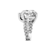 Heart Cut Diamond Solitaire Engagement Ring Set in White gold with Twisted Pavé Band and Prong Setting