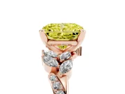Fancy Yellow Radiant Cut Diamond Solitaire Ring Set in Rose gold with Marquise Twist Band and Prong Setting
