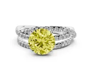 Fancy Yellow Round Cut Diamond Solitaire Twist Band Ring Set in Silver with Pavé Setting and Prong Head