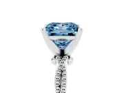 Fancy Blue Princess Cut Diamond Solitaire Ring Set in White gold with Twisted Band and Bead Prong Setting