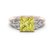 Fancy Yellow Princess Cut Diamond Cluster Ring Set in Rose gold with Round Accent Stones and Prong Setting on a Plain Band