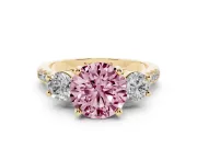 Fancy Pink Three-Stone Round Cut Diamond Pavé Band Ring Set in Yellow gold with Prong-Set Trio