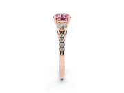 Fancy Pink Three-Stone Round Cut Diamond Pavé Band Ring Set in Rose gold with Prong-Set Trio
