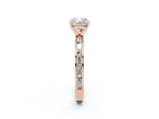 Cushion Cut Diamond Solitaire Ring Set in Rose gold with Channel-Set Baguette Band and Prong Setting