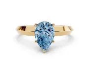 Fancy Blue Pear Cut Diamond Solitaire Engagement Ring Set in Yellow gold with Flat Band and Prong Setting