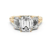 Emerald Cut Diamond Three-Stone Ring Set in Yellow gold with Braided Band