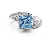 Fancy Blue Princess Cut Diamond Solitaire Ring Set in Platinum with Pavé Twist Band and Secure Prong Setting