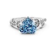 Fancy Blue Heart Cut Diamond Solitaire Leaf-Inspired Ring Set in White gold with Pavé Band and Prong Setting