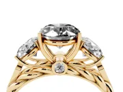 Fancy Black Oval Cut Diamond Three-Stone Ring Set in Yellow gold with Braided Band