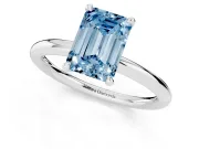 Fancy Blue Emerald Cut Diamond Solitaire Ring Set in Silver with Thin Band and Prong Setting