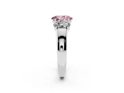 Fancy Pink Three-Stone Oval Cut Diamond Ring Set in White gold with Matching Prong Settings and Plain Band