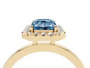 Fancy Blue Emerald Cut Diamond Halo Solitaire Ring Set in Yellow gold with Pavé Band and Prong Setting