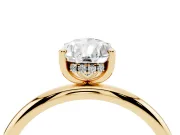 Pear Cut Diamond Solitaire Engagement Ring Set in Yellow gold with Prong Setting and Polished Band