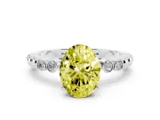 Fancy Yellow Oval Cut Diamond Solitaire Engagement Ring Set in Silver with Bezel Accents on Beaded Band