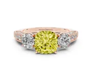 Fancy Yellow Cushion Cut Diamond Three-Stone Ring Set in Rose gold with Round Side Stones and Pavé Band