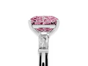 Fancy Pink Radiant Cut Diamond Solitaire Ring Set in White gold with Tapered Baguette Side Stones and Prong Setting