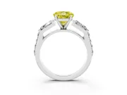 Fancy Yellow Round Cut Diamond Engagement Ring Set in Platinum with Baguette Side Stones and Channel Set Band