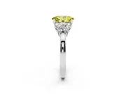 Fancy Yellow Oval Cut Diamond Solitaire Floral Ring Set in Platinum with Marquise Petals and Prong Setting