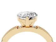 Heart Cut Diamond Solitaire Ring Set in Yellow gold with Slim Pavé Band and Prong Setting