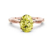 Fancy Yellow Oval Cut Diamond Solitaire Ring Set in Rose gold with Twisted Band and Bead Prong Setting