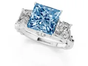 Fancy Blue Princess Cut Diamond Three-Stone Ring Set in Platinum with Braided Band