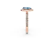 Fancy Blue Pear Cut Diamond Halo Ring Set in Rose gold with Bezel Frame and Pavé Band