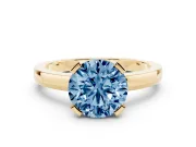 Fancy Blue Round Cut Diamond Solitaire Ring Set in Yellow gold with Prong Head and Smooth Polished Band