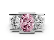Fancy Pink Oval Cut Diamond Three-Stone Channel Set Ring Set in Platinum with Smooth Polished Band