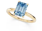 Fancy Blue Emerald Cut Diamond Solitaire Ring Set in Yellow gold with Thin Band and Prong Setting