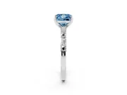 Fancy Blue Princess Cut Diamond Solitaire Set in Platinum with Side Baguettes and Channel Set Band