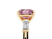 Fancy Pink Princess Cut Diamond Solitaire Ring Set in Yellow gold with Tapered Baguette Side Stones and Prong Setting