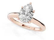 Pear Cut Diamond Solitaire Ring Set in Rose gold with Cathedral Band and Prong Setting