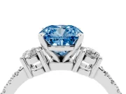 Fancy Blue Three-Stone Cushion Cut Diamond Pavé Band Ring Set in Platinum with Prong Setting