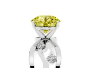 Fancy Yellow Round Cut Diamond Solitaire Ring Set in White gold with Side Stones on Criss-Cross Band and Prong Setting