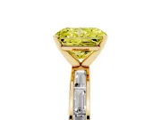 Fancy Yellow Radiant Cut Diamond Solitaire Ring Set in Yellow gold with Channel-Set Baguette Band and Prong Setting