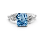 Fancy Blue Radiant Cut Diamond Solitaire Ring Set in Silver with Marquise Twist Band and Prong Setting