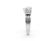 Three-Stone Heart Cut Diamond Channel Set Ring Set in Platinum with Bar Prongs