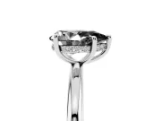 Fancy Black Pear Cut Diamond Solitaire Ring Set in Platinum with Thin Band and Prong Setting