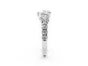Heart Cut Diamond Three-Stone Ring Set in Platinum with Pavé Band