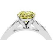 Fancy Yellow Oval Cut Diamond Solitaire Ring Set in Platinum with Channel-Set Band and Prong Setting