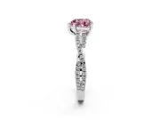 Fancy Pink Heart Cut Diamond Solitaire Engagement Ring Set in White gold with Twisted Pavé Band and Prong Setting