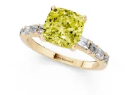 Fancy Yellow Cushion Cut Diamond Solitaire Set in Yellow gold with Side Baguettes and Channel Set Band