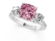 Fancy Pink Three-Stone Cushion Cut Diamond Pavé Band Ring Set in Platinum with Prong-Set Trio
