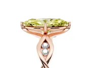 Fancy Yellow Marquise Cut Diamond Twist Band Solitaire Ring Set in Rose gold with Leaf Prong Setting and Accent Stones